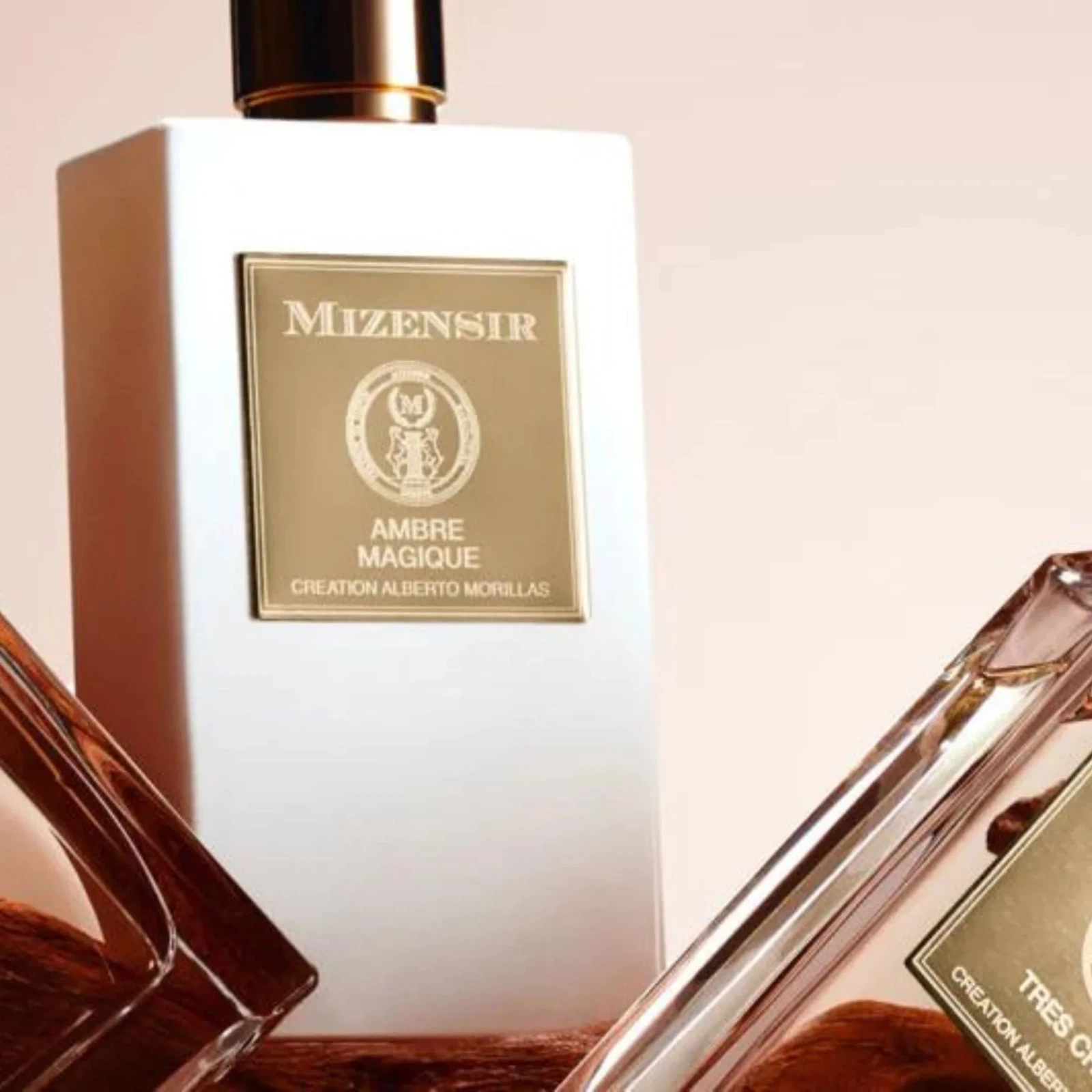 Mizensir Parfums Ambre Magique manufacturer bottle, linked from the supplied product catalogue.