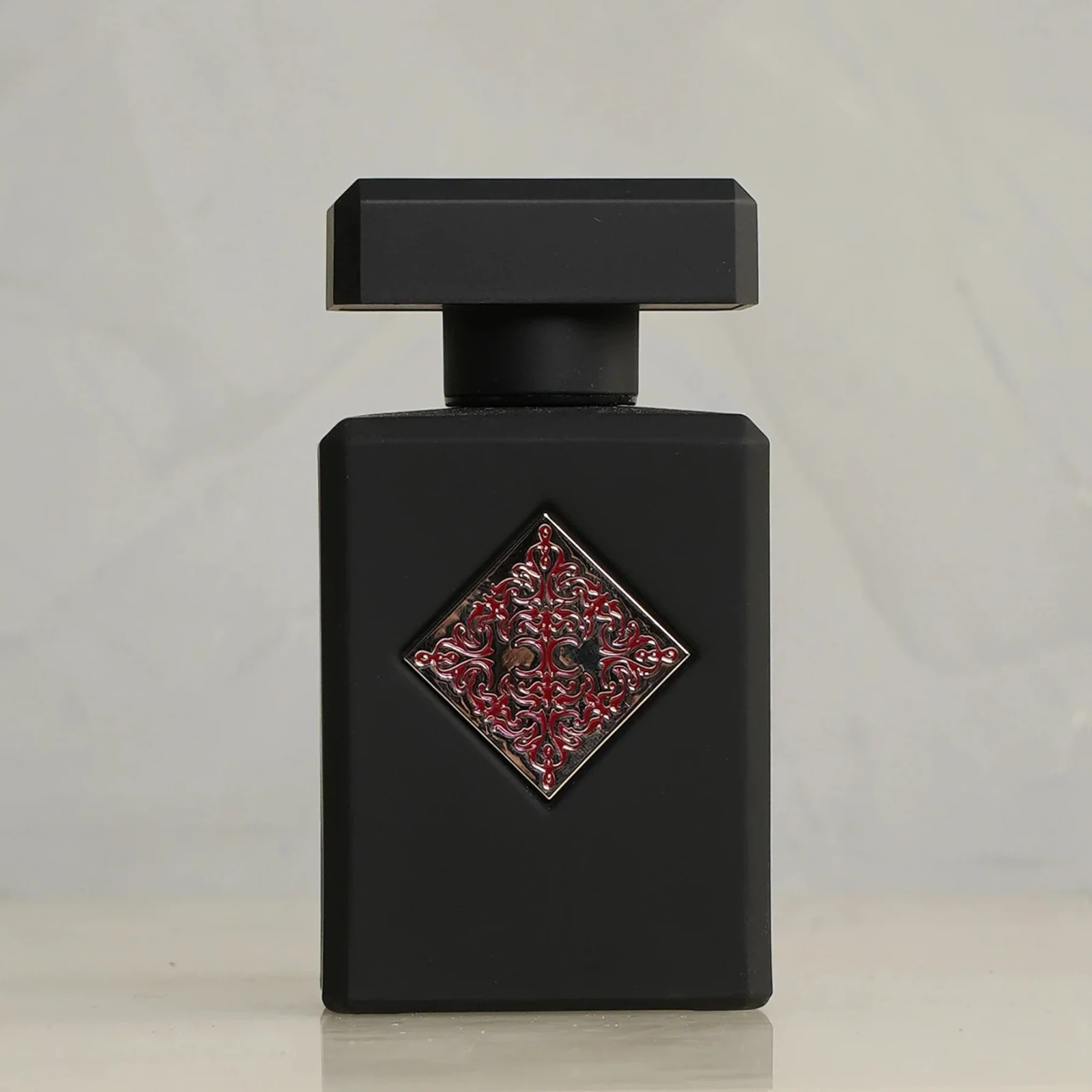Initio Parfums The Absolutes Addictive Vibration manufacturer bottle, linked from the supplied product catalogue.