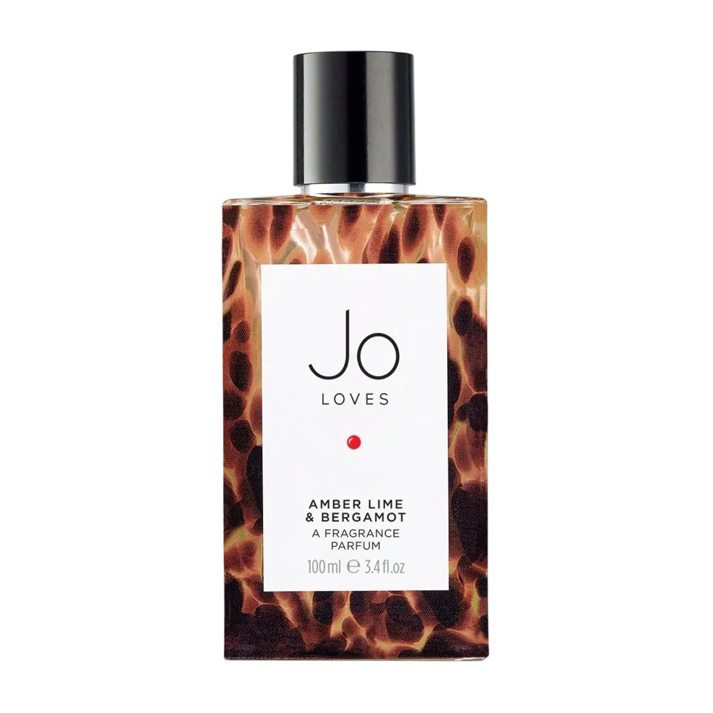Jo Loves Amber Lime & Bergamot Parfum Woody Aromatic manufacturer bottle, linked from the supplied product catalogue.