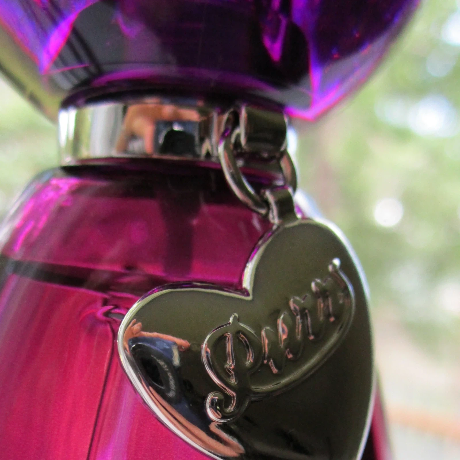 Katy Perry Purr Spray manufacturer bottle, linked from the supplied product catalogue.