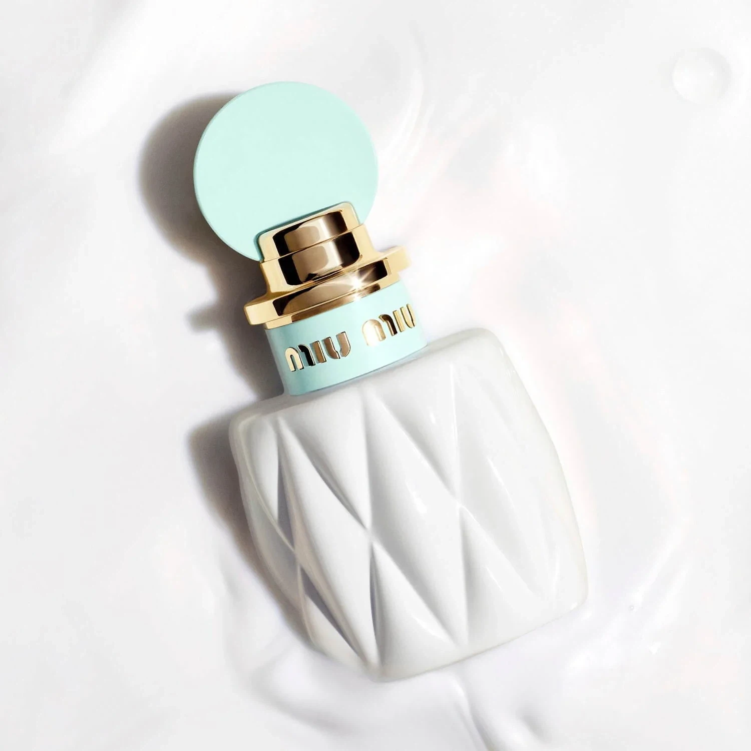 Miu Miu Fleur De Lait manufacturer bottle, linked from the supplied product catalogue.