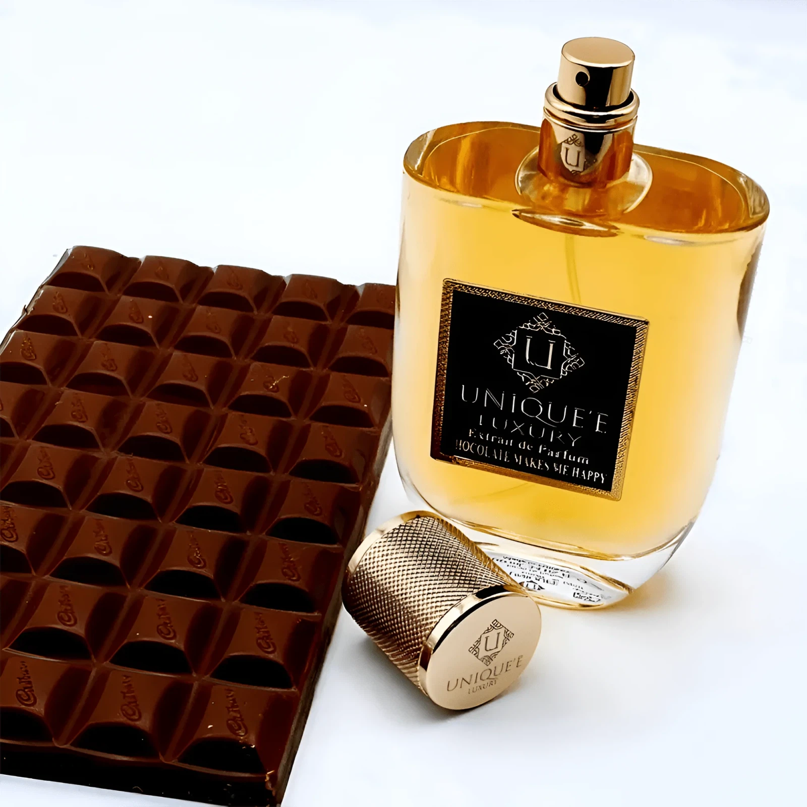 Unique'e Luxury Chocolate Makes Me Happy manufacturer bottle, linked from the supplied product catalogue.