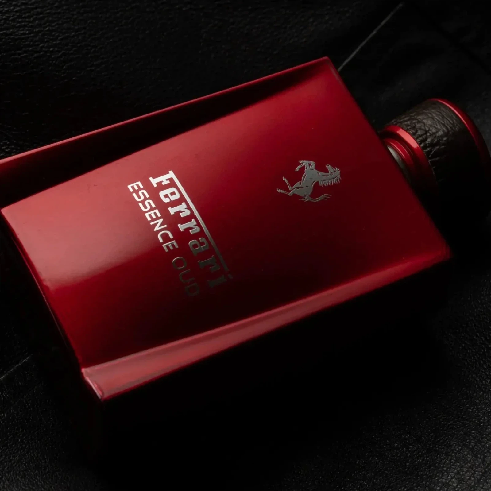 Ferrari Amber Essence manufacturer bottle, linked from the supplied product catalogue.