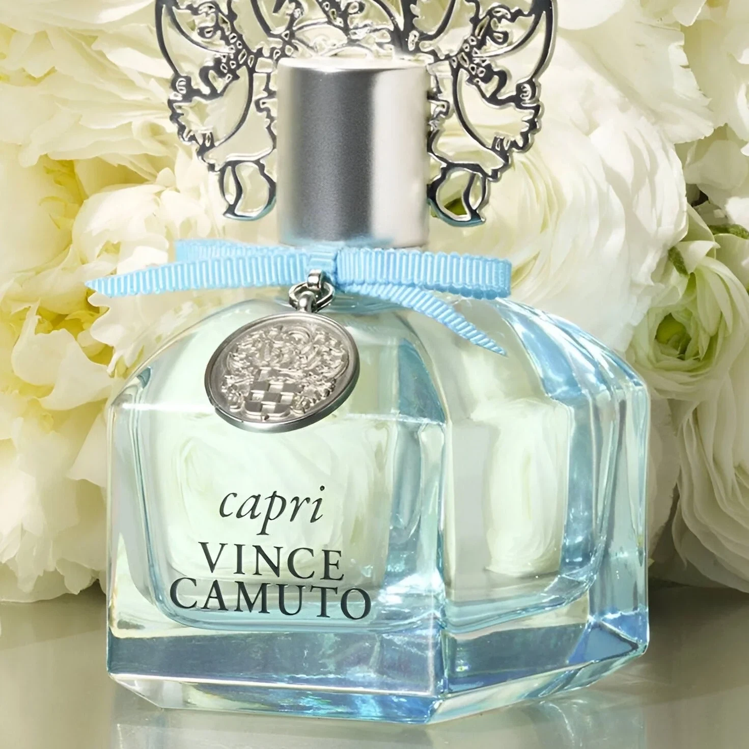 Vince Camuto CAPRI manufacturer bottle, linked from the supplied product catalogue.