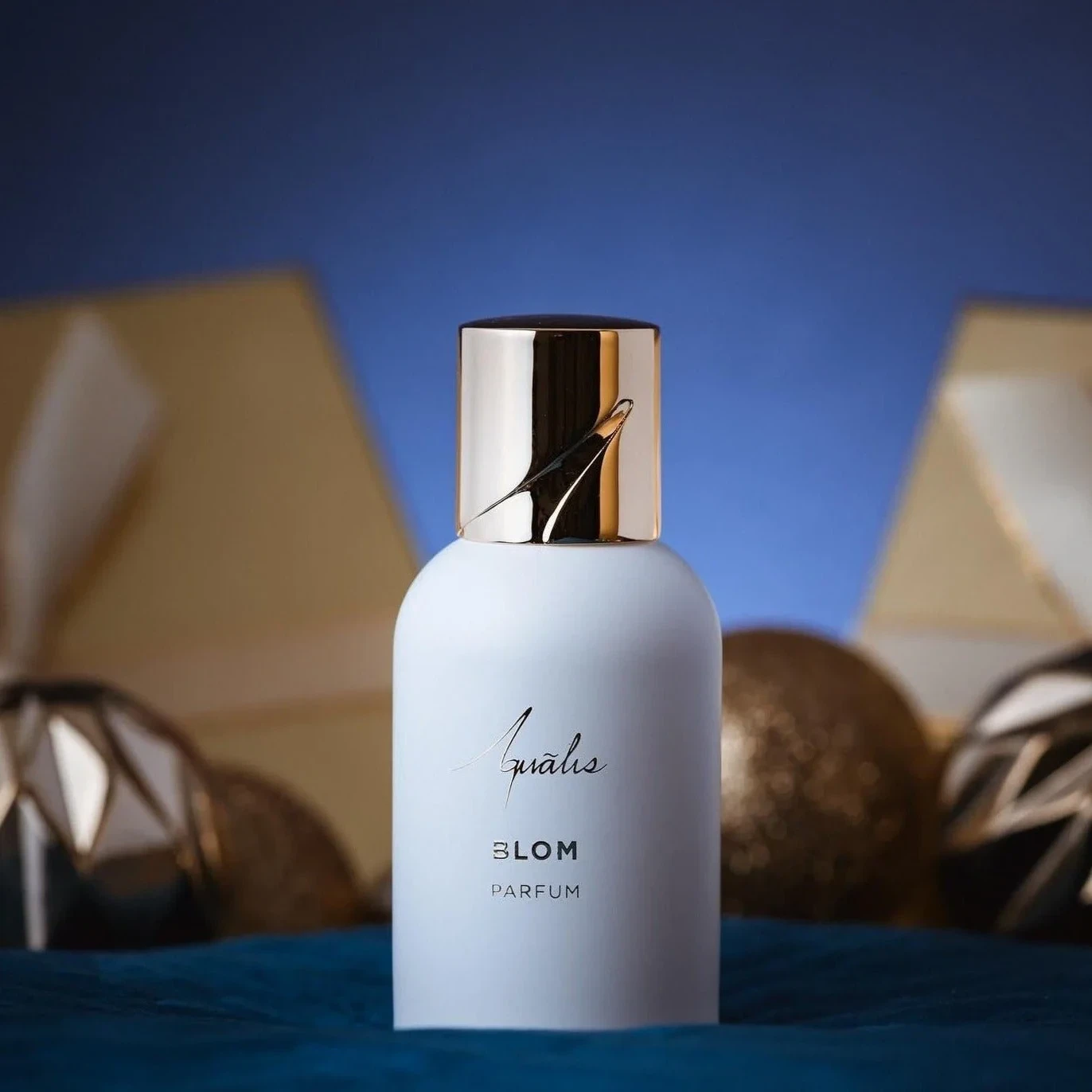 Aqualis Blom Parfum manufacturer bottle, linked from the supplied product catalogue.