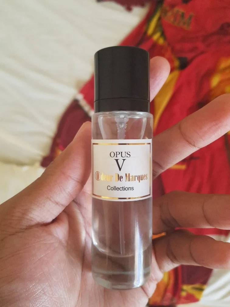 Odeur De Marques Opus V manufacturer bottle, linked from the supplied product catalogue.
