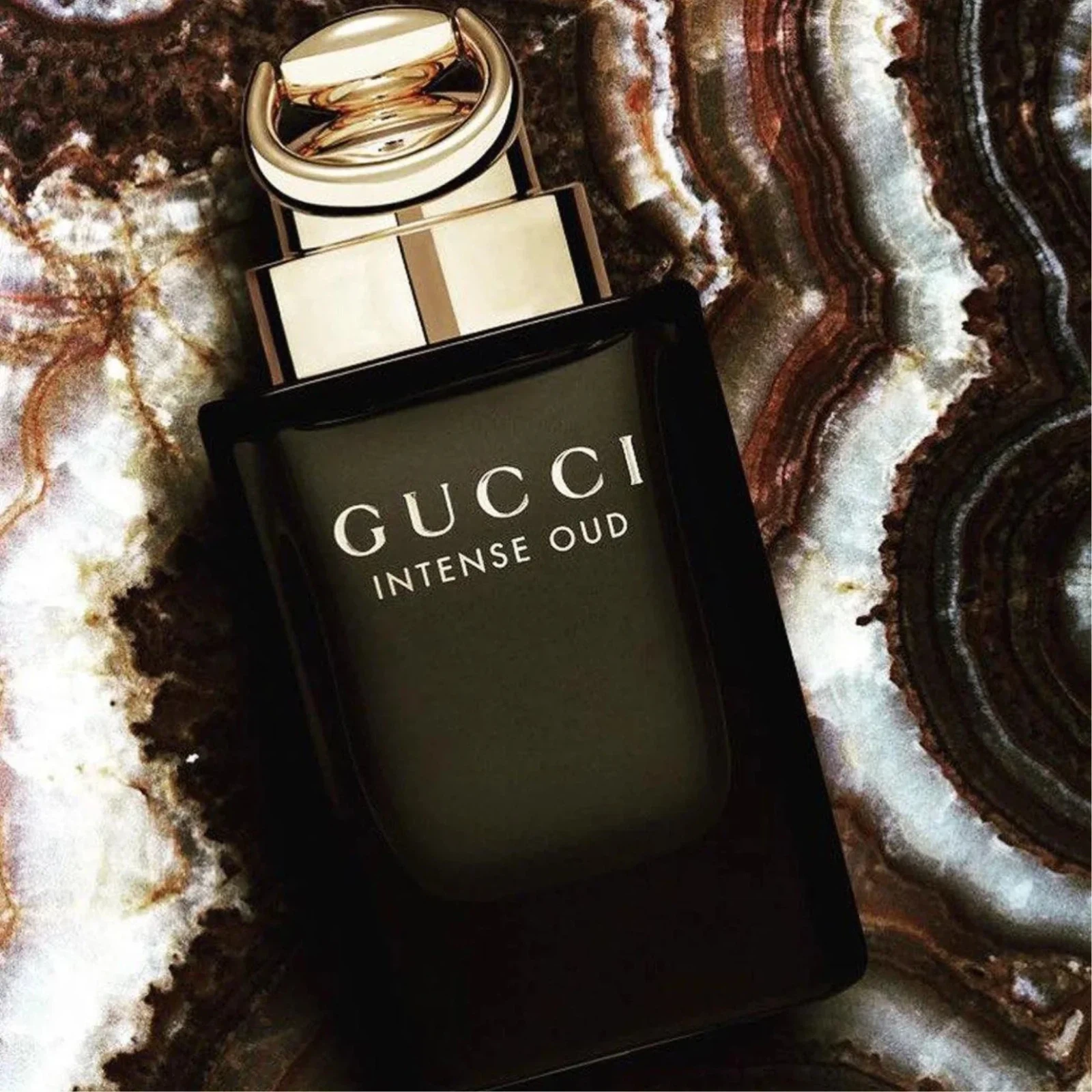 Gucci Intense Oud manufacturer bottle, linked from the supplied product catalogue.